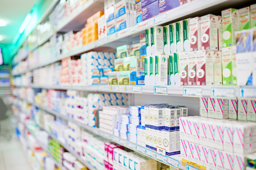 An aisle in a pharmacy. The commercial product(s) or designs displayed in this image represent simulations of a real product, and are changed or altered enough so that they are free of any copyright infringements. Our team of retouching and design specialists custom designed these elements for each photo shoot http://195.154.178.81/DATA/i_collage/pi/shoots/784992.jpg